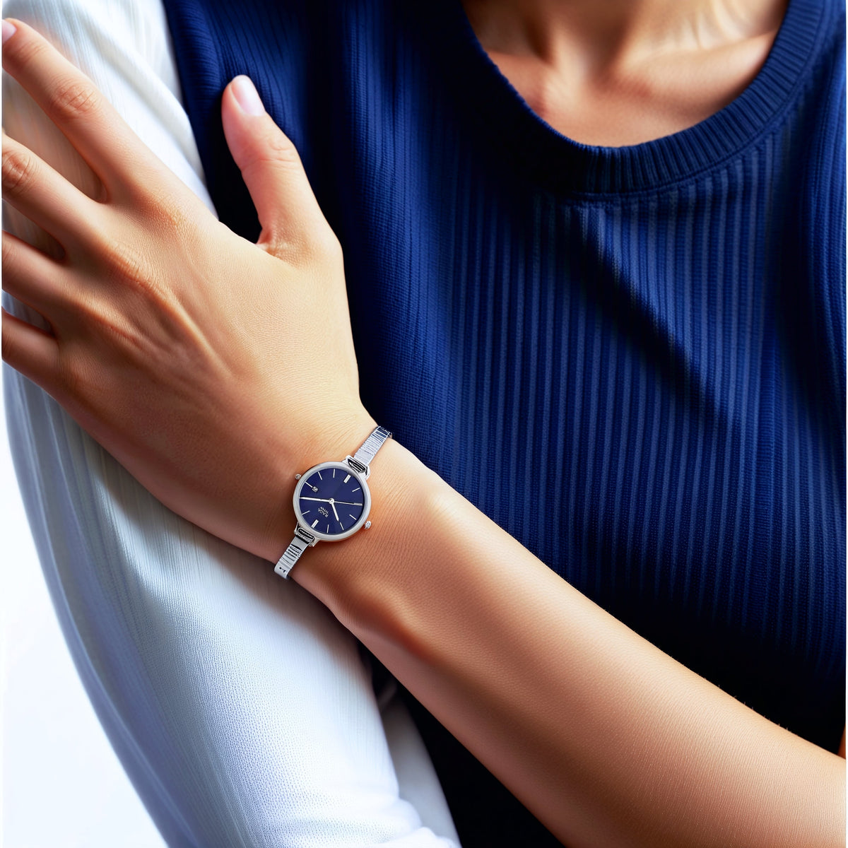 Titan Raga Viva Blue Dial Analog with Date Metal Strap Watch for Women 2578SM01