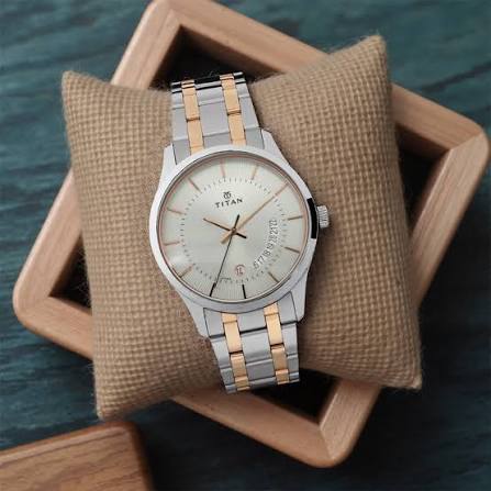 Titan Quartz Analog with Date Silver Dial Stainless Steel Strap Watch for Men 1823KM01